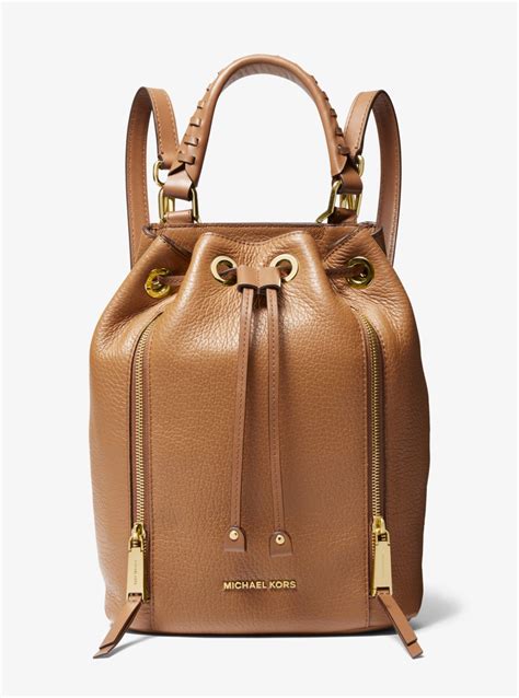 michael kors viv medium pebbled leather bucket backpack|Michael Kors Backpack beige.